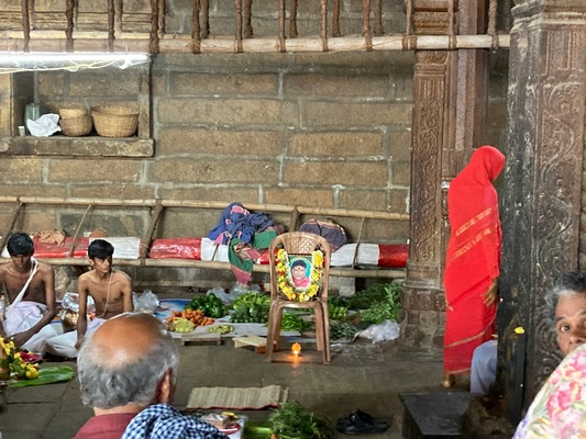 people with photo of the departed